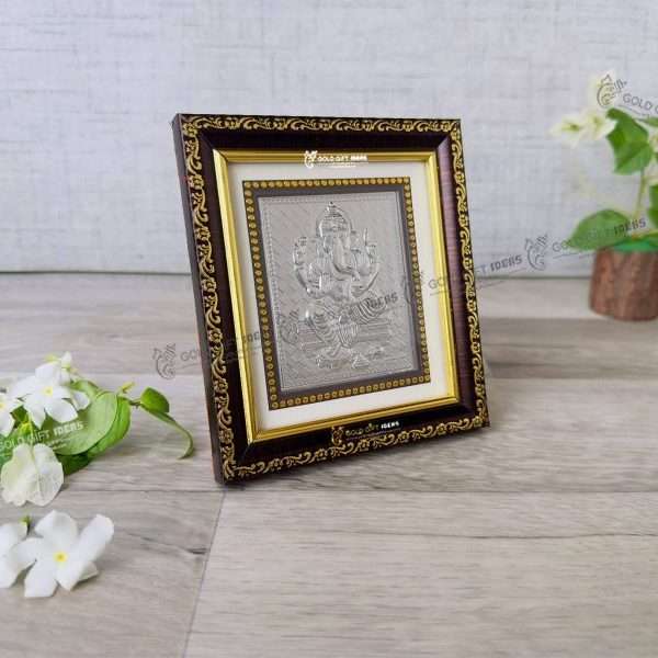 999 silver Ganesh frame, silver Ganesh photo frame, pure silver god photo frames, ganesha photo frame, silver ganesha frame, gold Ganesha frame, lord Ganesha frame, Ganesha frame with charan paduka, return gifts, Ganesha wooden photo frame, ganpati photo frame, Ganesh photo with mantra, ganesh photo with frame, ganesh photo with name, Ganpati photo hd, return gifts for wedding, return gifts for pooja