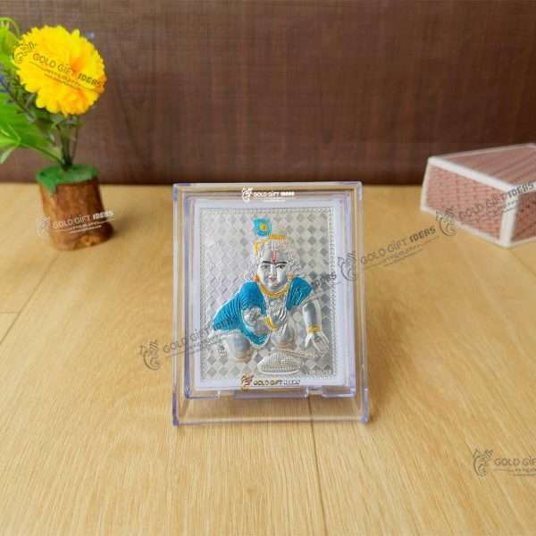 Silver Bal Gopal Frame silver bal krishna murti silver krishna frame silver bal gopal murti silver gift items for pooja silver gift items return gifts for baby shower silver bal gopal frame for gift Bal gopal photo frame, bal gopal wooden photo frame, bal gopal frame with mantra, bal gopal photo with quotes, bal gopal photo with mantra, bal gopal statue, return gifts