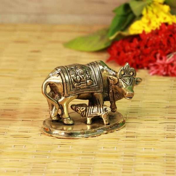 brass cow and calf, brass cow with calf, cow and calf statue brass, cow and calf idol brass, cow and calf feeding, cow feeding calf statue, return gifts for pooja, diwali gift, diwali return gift, birthday return gift, return gifts, wedding gift, wedding return gift, baby shower gift, baby shower return gift, occasional gift, housewarming gift, housewarming return gift